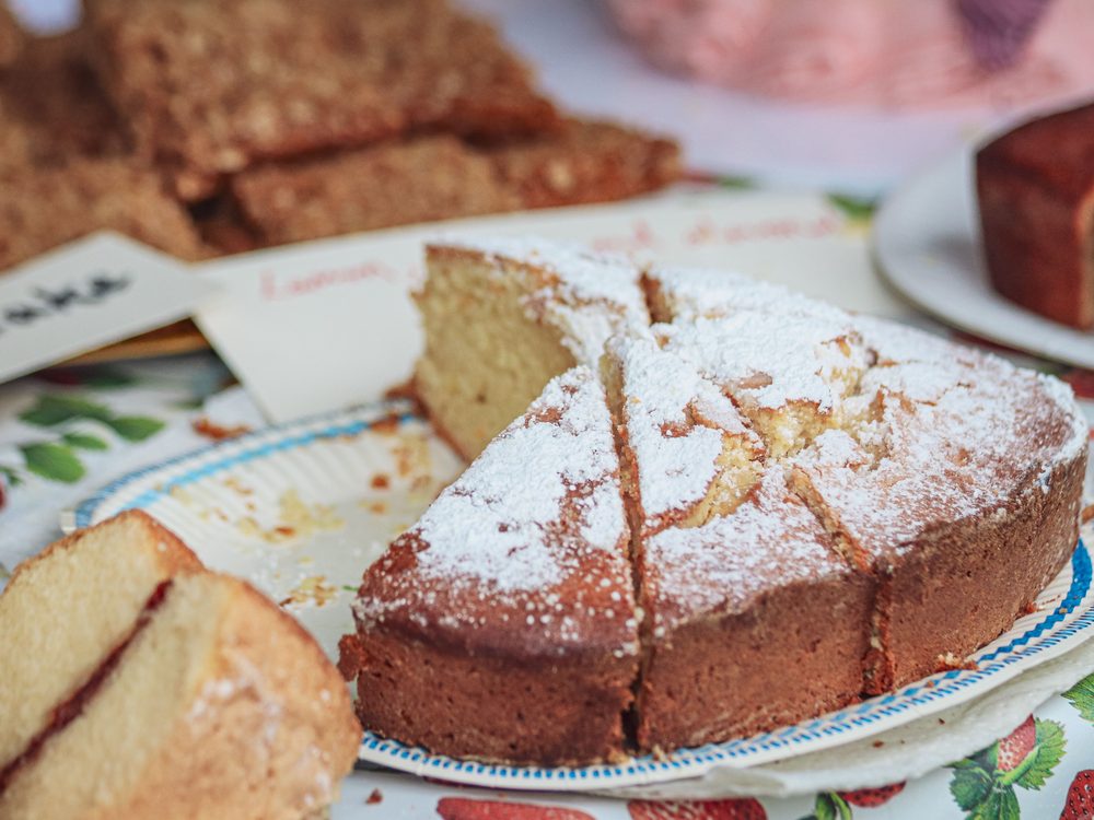 A spread of homemade cakes and bakes ready for collection
